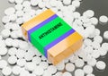 Box of antihistamine medicine on top of pills on laboratory table