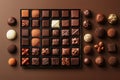 Box of Assorted Chocolates on Brown Backdrop, Collection of Round and Square Treats Royalty Free Stock Photo