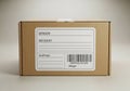 Box with a blank white shipping label featuring sections for Royalty Free Stock Photo