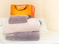 A box of Bounce dryer sheets is placed on clean folded towels - Front view Royalty Free Stock Photo