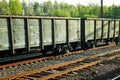 Box cars and tanker on tracks