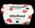 Chobani Strawberry Greek Yogurt on Black Backdrop Royalty Free Stock Photo