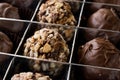 Box of Chocolate Pralines with Hazelnuts. Royalty Free Stock Photo