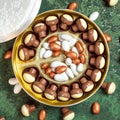 Box of chocolates and confetto or sugared almond Royalty Free Stock Photo
