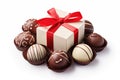 Box of chocolates with red ribbon and bow isolated on white background Royalty Free Stock Photo