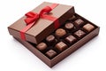Box of chocolates with a red ribbon on a white background Royalty Free Stock Photo