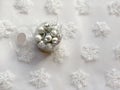 Christmas angel toy across white background with snowflakes. Christmas conceptBox with christmas silver balls across white snowfla Royalty Free Stock Photo