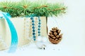 Box with Christmas toys, blue and silver beads, blue ribbon and Royalty Free Stock Photo