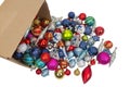 Box of Christmas Tree Ornaments Poured Out On White Background Royalty Free Stock Photo