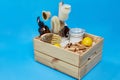 Box with clothespins and natural cleaning supplies