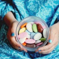 Box with colorful candies in child's hands Royalty Free Stock Photo