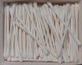 Box with cotton buds viewed from above, used to clean noses, ears and other orifices. Used style of a box, with swabs lying inside Royalty Free Stock Photo