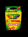 Box of Crayola Crayons on a black backdrop Royalty Free Stock Photo