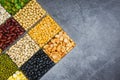 Box of different whole grains beans and legumes seeds lentils and nuts colorful snack background top view - Collage various beans Royalty Free Stock Photo