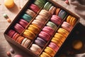 A box filled with exquisite French macarons, a delightful confectionery experience.