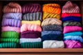 Box filled with lots of different colored yarns and hats. Generative AI