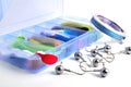 Box for fishing accessories with silicone baits inside, Jig hooks, braided reel on a white background Royalty Free Stock Photo