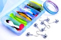 Box for fishing accessories with silicone baits inside, Jig hooks, braided reel on a white background Royalty Free Stock Photo