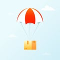 Box flying on parachute icon