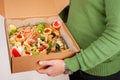 A box of food, cheese, breads, fish, shrimp. Food delivery for the company, romantic, office dinner at home. Beautiful composition Royalty Free Stock Photo