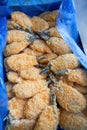 A box of frozen food semi-finished fried butterfly shrimp