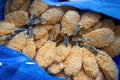 A box of frozen food semi-finished fried butterfly shrimp