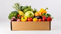 Box full of food in concept delivery and donation box. Cardboard box full of colorful fresh vegetables, fruits Royalty Free Stock Photo