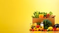 Box full of food in concept delivery and donation box. Cardboard box full of colorful fresh vegetables, fruits Royalty Free Stock Photo