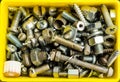 Box full of old bolts, different condition and size Royalty Free Stock Photo