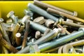 Box full of old bolts, different condition and size Royalty Free Stock Photo