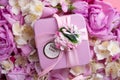 Box with gift  around roses  and  jasmine background. romantic and beauty concept Royalty Free Stock Photo