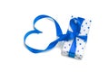 Box with a gift with the image of hearts tied with a ribbon isolate on a white background. Valentine`s Day celebration concept Royalty Free Stock Photo