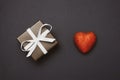 Box with a gift with the image of hearts tied with a ribbon isolate on a white background. Valentine`s Day celebration concept Royalty Free Stock Photo