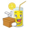 With box glass fresh lemon juice on mascot Royalty Free Stock Photo