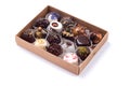 Box of handicrafted truffles isolated on white Royalty Free Stock Photo