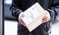 Box, hands and courier at with mail for a delivery, ecommerce work or cargo shipping. Closeup, logistics and man or Royalty Free Stock Photo