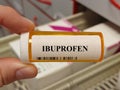Box of ibuprofen tablets placed on a table, over-the-counter anti-inflammatory Royalty Free Stock Photo