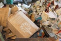 Piles of old cardboard boxes stored for recycling. Closeup