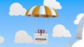Box with AMAZON logo falls with a parachute. Editorial 3D rendering Royalty Free Stock Photo