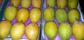 A box of mangoes available at the market, Mango macro closeup