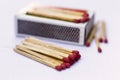 Box of matches on a wooden table. Royalty Free Stock Photo