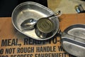 Box of Militay MRE`s, C-rations and Mess kit. Royalty Free Stock Photo