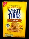 A Box of Nabisco Wheat Thins on a Black Backdrop