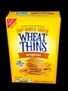 A Box of Nabisco Wheat Thins on a Black Backdrop