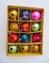 Box with old christmas balls in the snow Royalty Free Stock Photo