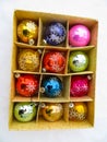 Box with old christmas balls in the snow Royalty Free Stock Photo