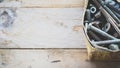 Box of old rusty metal screws on wooden background Royalty Free Stock Photo