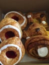 Box of Danish Pastries with Icing and Custard