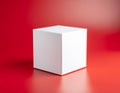 The box is plain, with a smooth surface and sharp edges, casting a soft shadow on the surface Royalty Free Stock Photo