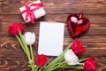 Box with present, heart, empty tag and bright red and white tul